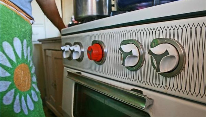 Knobs on a 1970s gas-burning stove Knobs on a 1970s gas-burning stove
