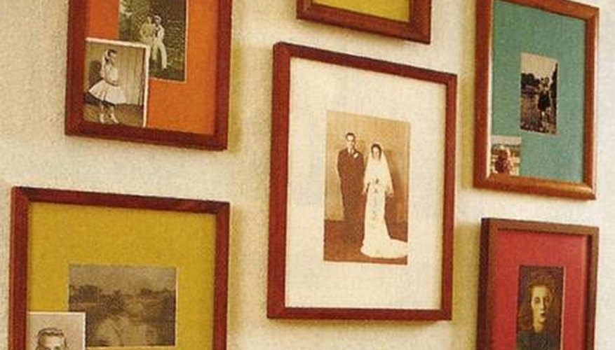 Group photos in like frames to arrange creative displays. Group photos in like frames to arrange creative displays.