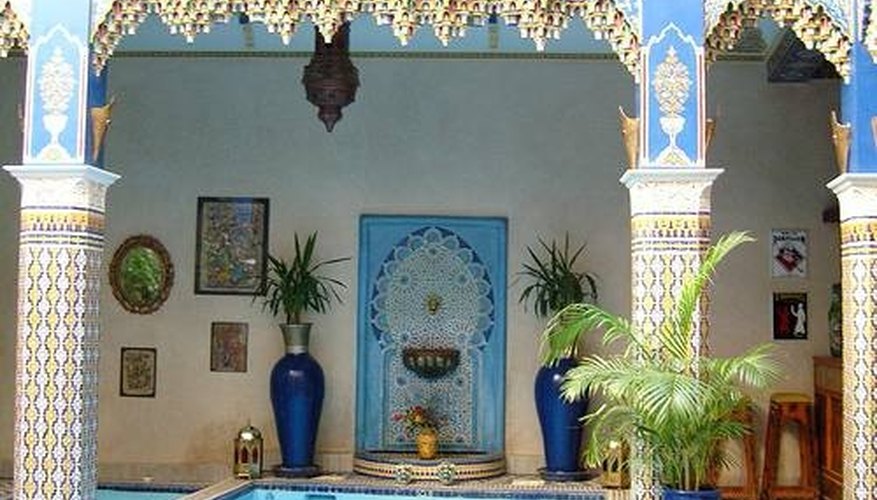 A Moroccan courtyard and pool, with traditional tile inlay. A Moroccan courtyard and pool, with traditional tile inlay.
