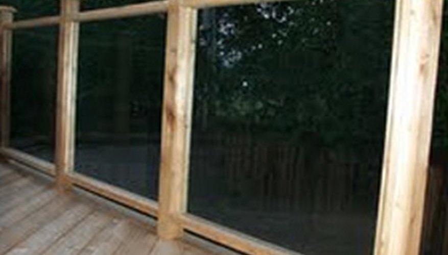 A glass railing offers a clear view beyond A glass railing offers a clear view beyond