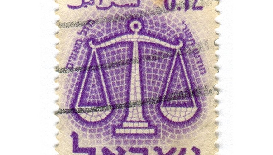 Balance scale as depicted on a postage stamp. Balance scale as depicted on a postage stamp.