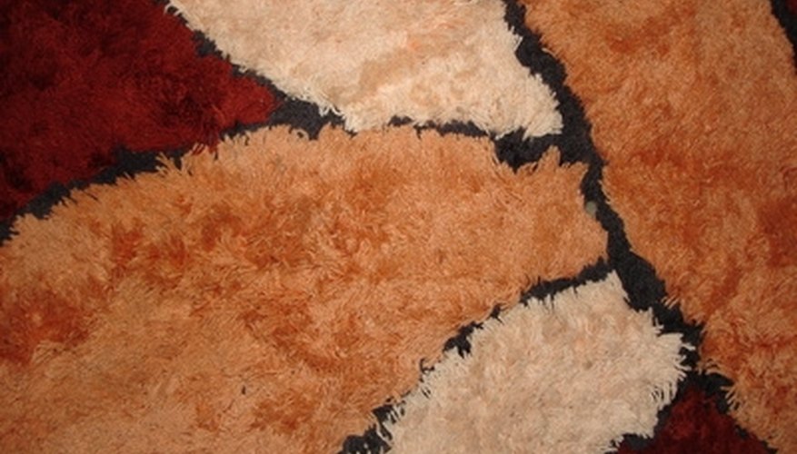 Restore a carpet's soft feel by removing dried on fabric glue Restore a carpet's soft feel by removing dried on fabric glue