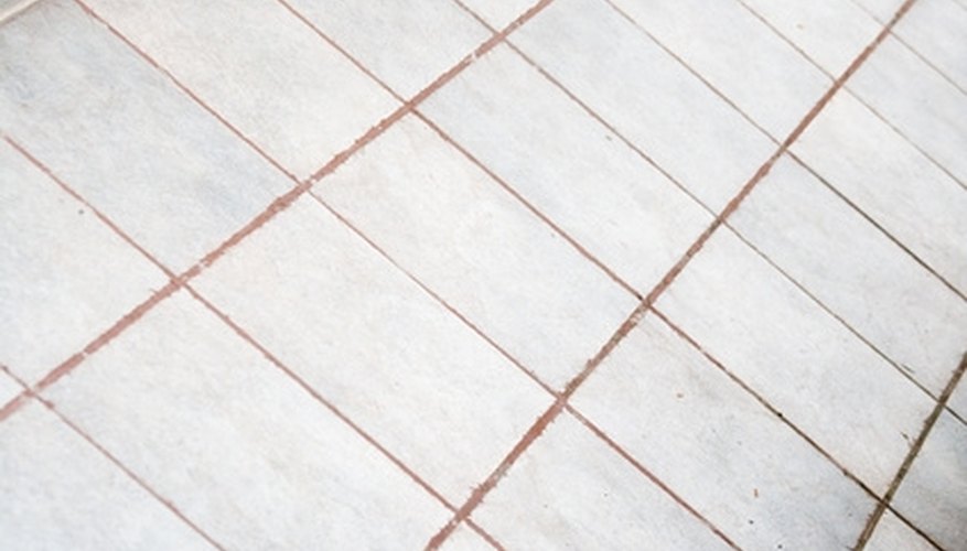 Grout is used to hold tiles firmly in place. Grout is used to hold tiles firmly in place.
