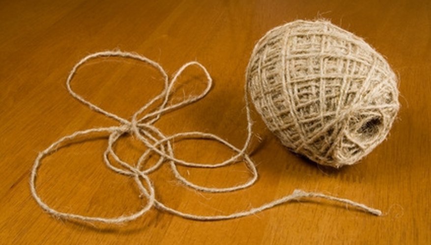 Use a sturdy twine to bind the items together. Use a sturdy twine to bind the items together.