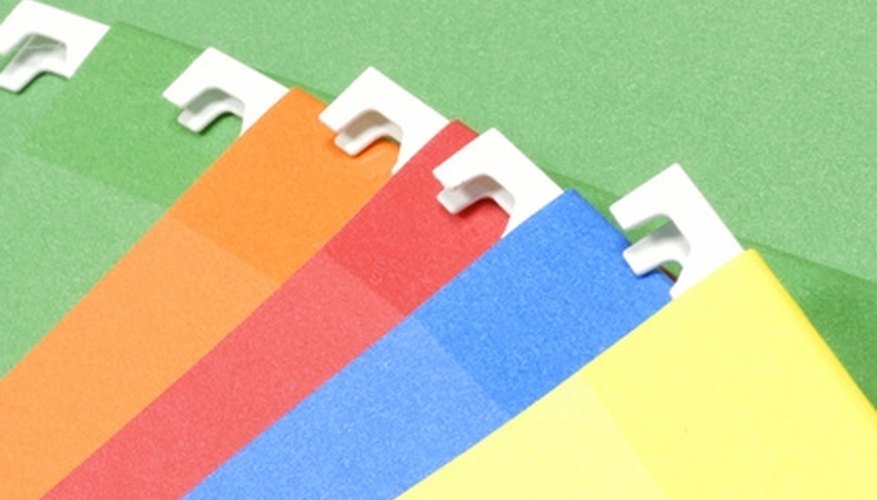 Hanging files must be placed on rails in a filing cabinet. Hanging files must be placed on rails in a filing cabinet.