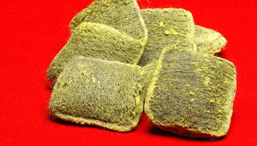 Scrub racks with steel wool for baked on spills. Scrub racks with steel wool for baked on spills.