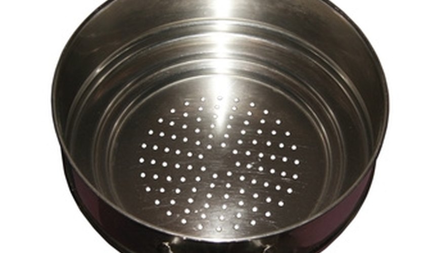 Use a colander for a different lamp shade. Use a colander for a different lamp shade.