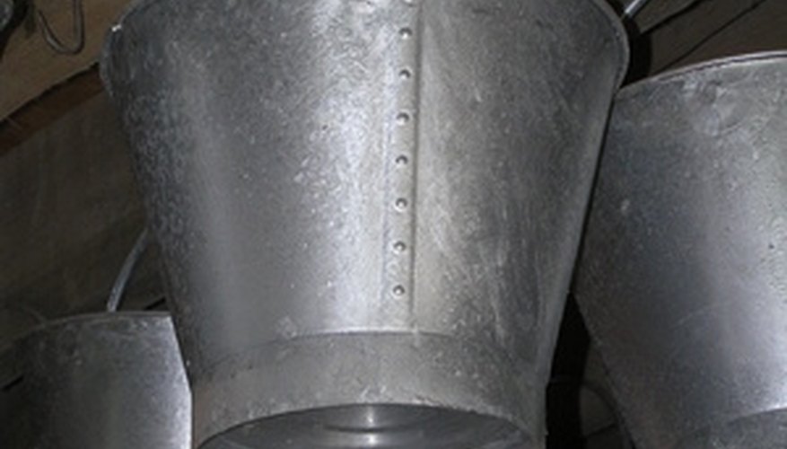 Vintage metal buckets can become lamp shades. Vintage metal buckets can become lamp shades.