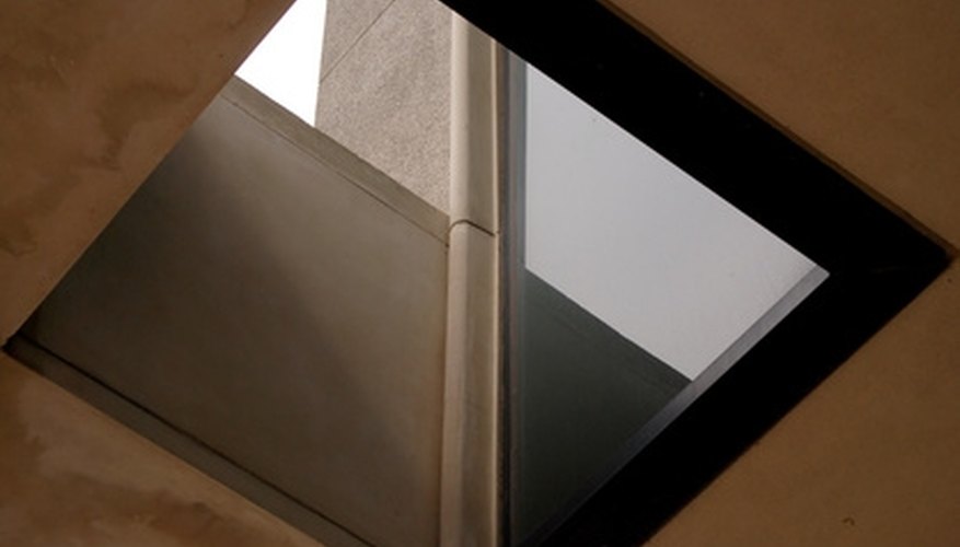 Cut a hole in the roof to install a skylight. Cut a hole in the roof to install a skylight.