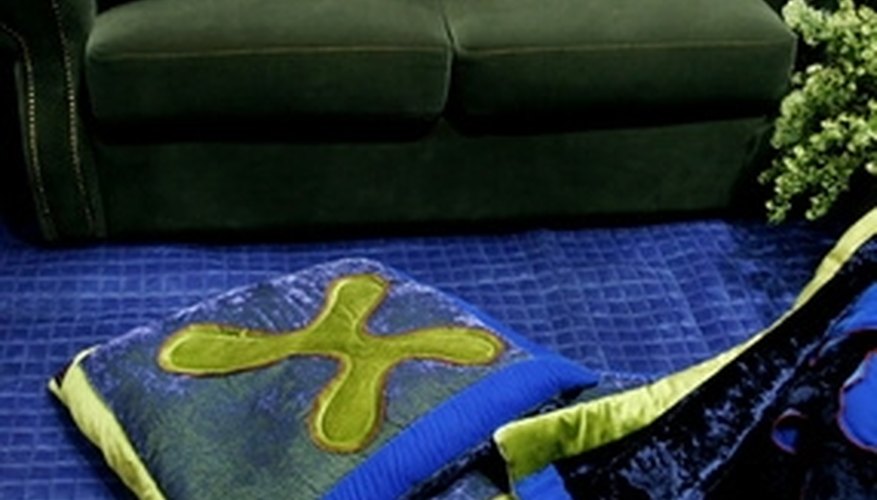 Use rubbing alcohol to remove tar from upholstered furniture. Use rubbing alcohol to remove tar from upholstered furniture.