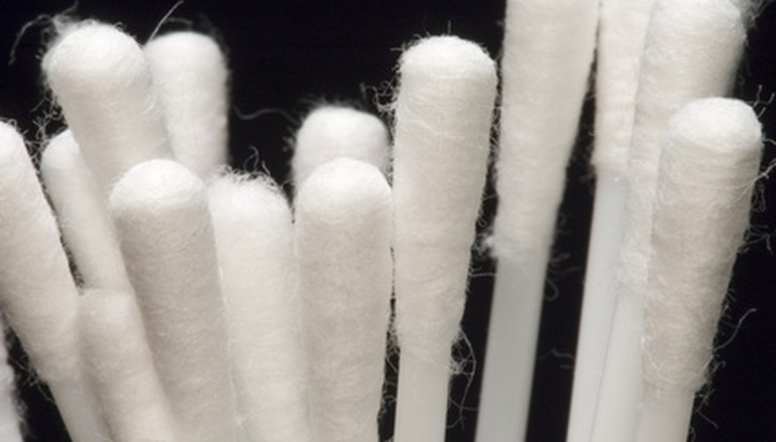 Cotton swabs are the perfect-sized tool to tackle ink stains. Cotton swabs are the perfect-sized tool to tackle ink stains.