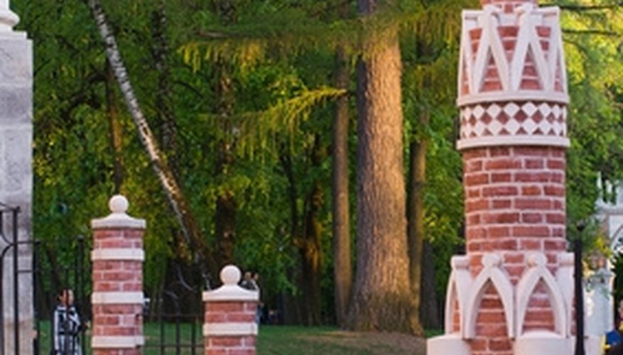 Brick support columns can add style and support to older fencing. Brick support columns can add style and support to older fencing.