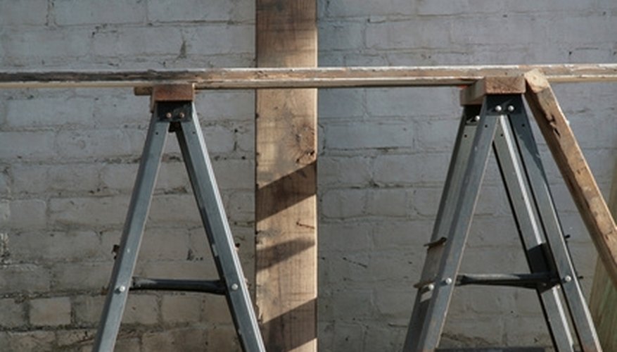 Place sawhorses evenly for a good workspace. Place sawhorses evenly for a good workspace.