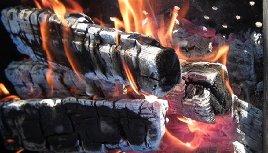 Build a wood-fired adjustable grill to cook in your outdoor living space. Build a wood-fired adjustable grill to cook in your outdoor living space.