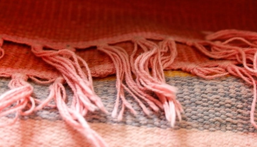 Use vinegar on wool rugs to restore them and remove stains. Use vinegar on wool rugs to restore them and remove stains.
