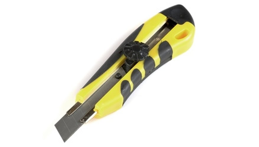 Use a utility knife to strip back the sheathing. Use a utility knife to strip back the sheathing.