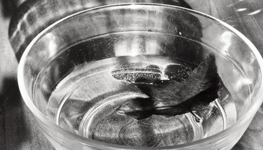 Place a bowl of water near the grill. Place a bowl of water near the grill.