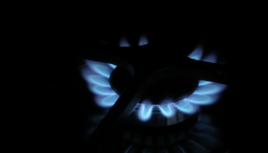 Wipe the burners with a soft cloth. Wipe the burners with a soft cloth.