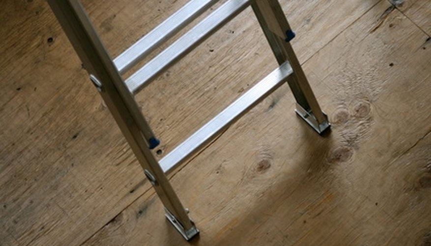 A 32-foot ladder requires two people to set up. A 32-foot ladder requires two people to set up.
