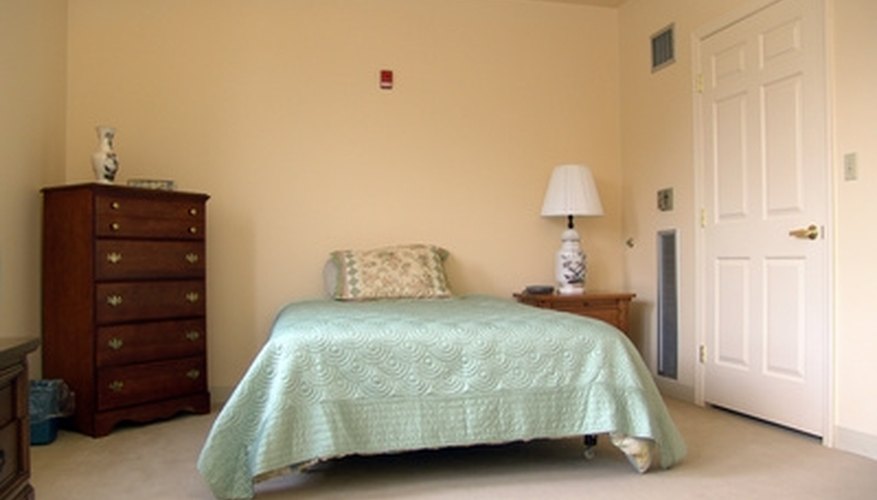 Center the bed if the room is large enough. Center the bed if the room is large enough.
