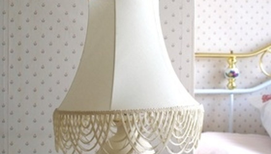 If it's a guest bedroom, consider putting a pretty table lamp beside the bed. If it's a guest bedroom, consider putting a pretty table lamp beside the bed.