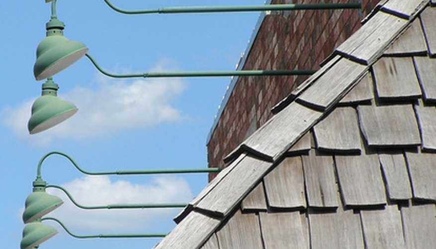 Step-flash ridges and cover with ridge caps to join two roof areas together. Step-flash ridges and cover with ridge caps to join two roof areas together.