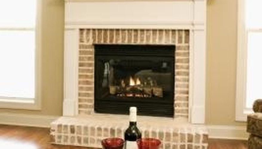Arrange a decorative serving tray on your ottoman. Arrange a decorative serving tray on your ottoman.