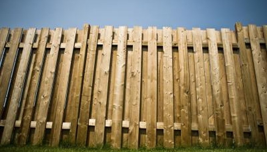 Moisture in fence wood attracts airborne mildew spores. Moisture in fence wood attracts airborne mildew spores.