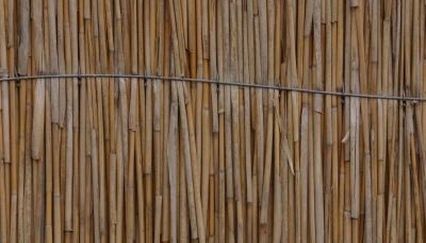 Bamboo fence extensions offer an attractive privacy screen. Bamboo fence extensions offer an attractive privacy screen.