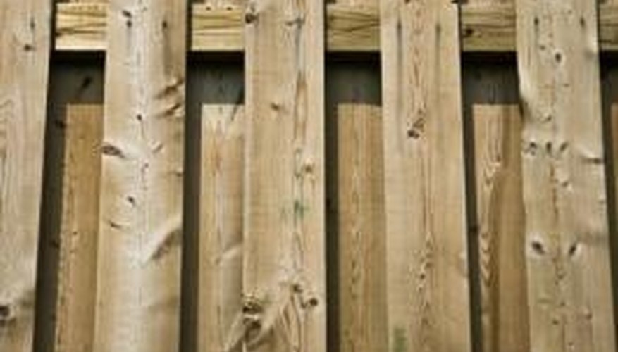 A privacy fence will hide your trash cans. A privacy fence will hide your trash cans.