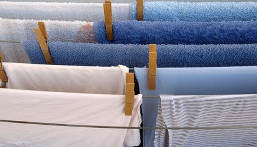 Laundry detergents contain phosphors that make whites whiter, causing certain fabircs to glow under black light. Laundry detergents contain phosphors that make whites whiter, causing certain fabircs to glow under black light.