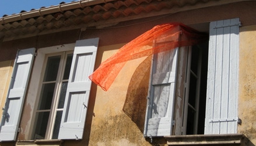 Gutters run adjacent to rooftops to disperse rain water. Gutters run adjacent to rooftops to disperse rain water.