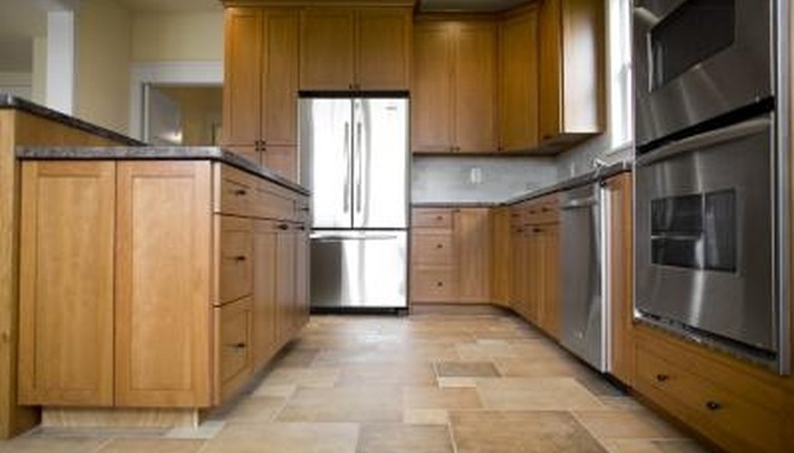 Caulking protects the space between tile and a cabinet or baseboard. Caulking protects the space between tile and a cabinet or baseboard.