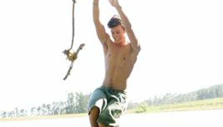 Create a rope swing by throwing a rope over a tree branch. Create a rope swing by throwing a rope over a tree branch.