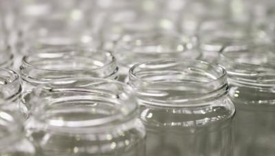 Empty jars filled with attractants lure unsuspecting houseflies. Empty jars filled with attractants lure unsuspecting houseflies.