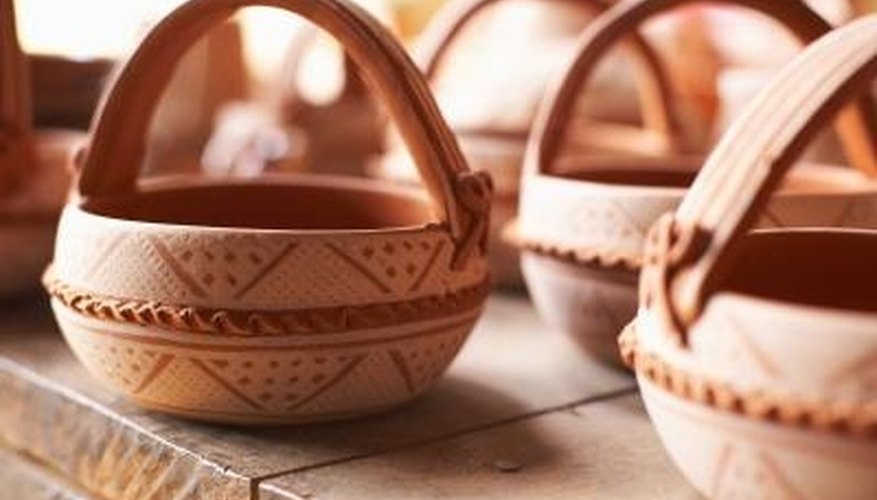 Cook delicious stews in clay pots over open flames. Cook delicious stews in clay pots over open flames.
