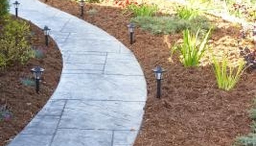 River Rock Vs. Mulch | Garden Guides