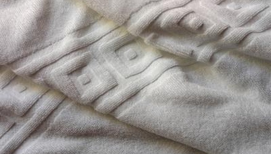 Bath towels are usually plain, except for a stripe of embellishment. Bath towels are usually plain, except for a stripe of embellishment.