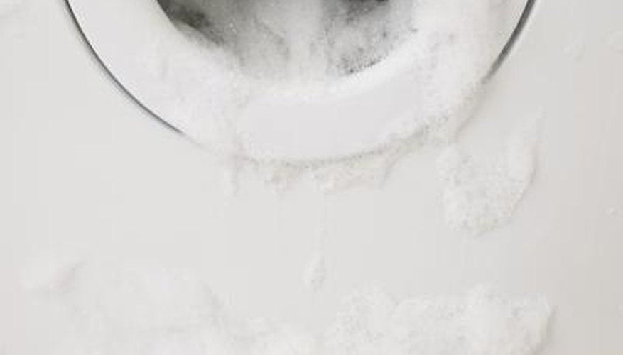 The right amount of HE laundry detergent prevents water leaks. The right amount of HE laundry detergent prevents water leaks.