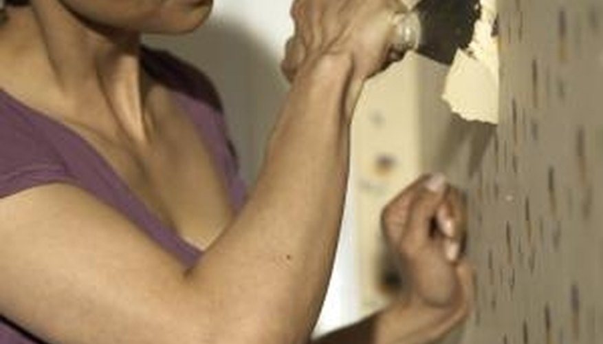Stripping old wall paper is a time-consuming job. Stripping old wall paper is a time-consuming job.