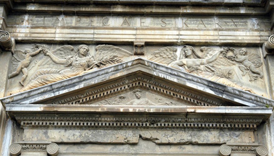 A pediment adorns a building's main entry. A pediment adorns a building's main entry.