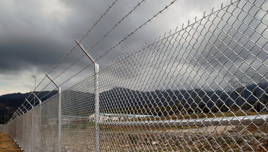 Thousands of miles of metal chain link fence have been installed in the USA alone. Thousands of miles of metal chain link fence have been installed in the USA alone.