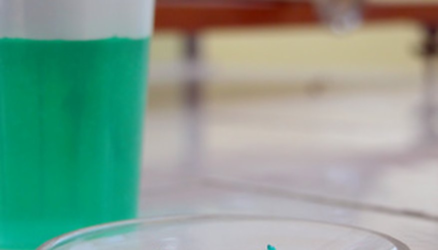Photo Credit: solution and powder image by Radu Razvan from <a href='http://www.fotolia.com'>Fotolia.com</a> How to Calculate PH of Buffer Solutions