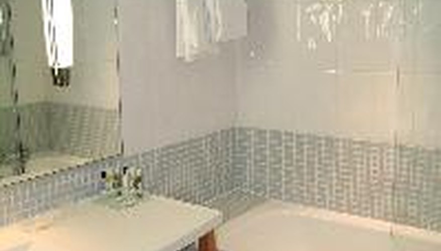 A master bathroom with several towel bar installations for the comfort and use of two people A master bathroom with several towel bar installations for the comfort and use of two people