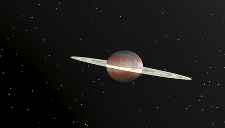 Photo Credit: saturn image by goce risteski from <a href='http://www.fotolia.com'>Fotolia.com</a> The planet Saturn is has large, spectacular rings.