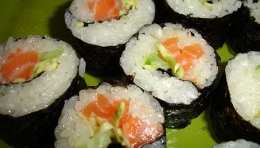 Photo Credit: sushi image by Maryna Girard from <a href='http://www.fotolia.com'>Fotolia.com</a> Sushi is wrapped in seaweed.