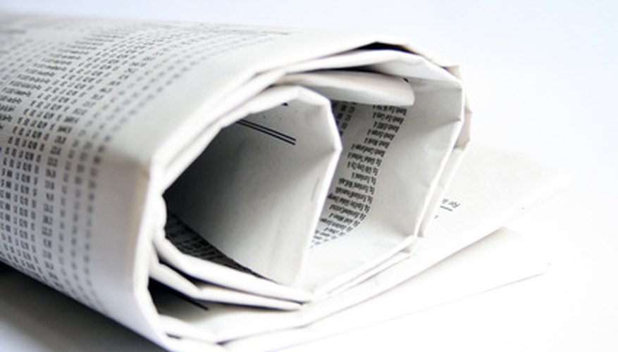 Photo Credit: rolled newspaper 1 image by Piotr Bizior from <a href='http://www.fotolia.com'>Fotolia.com</a> Advertise your childcare business to build your client base.