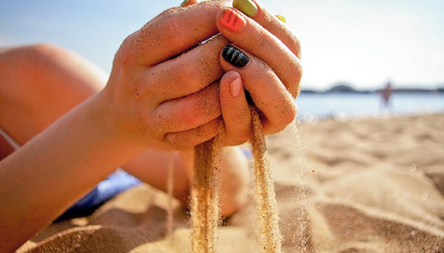 Photo Credit: sand image by WWWest from <a href='http://www.fotolia.com'>Fotolia.com</a> Sand casting requires few specialized tools.