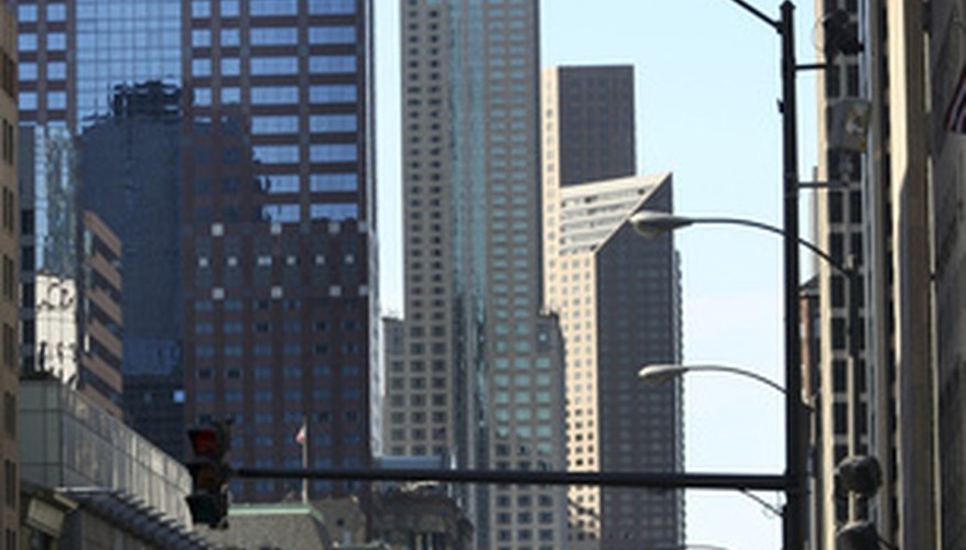 Photo Credit: street city image by breezeart.us from <a href='http://www.fotolia.com'>Fotolia.com</a> Mergers can lead to monopolies.