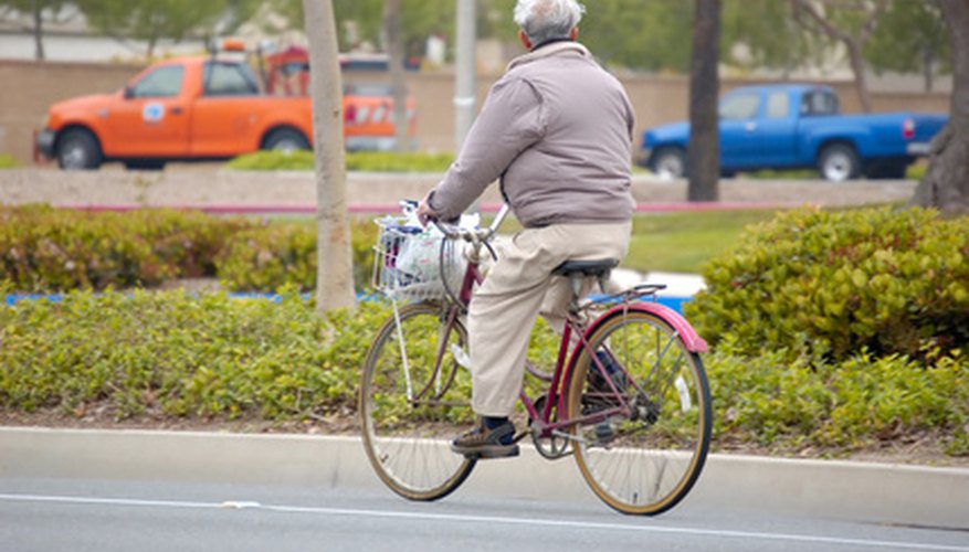 Photo Credit: bike image by Byron Moore from <a href='http://www.fotolia.com'>Fotolia.com</a> Bike or walk short distances instead of driving.